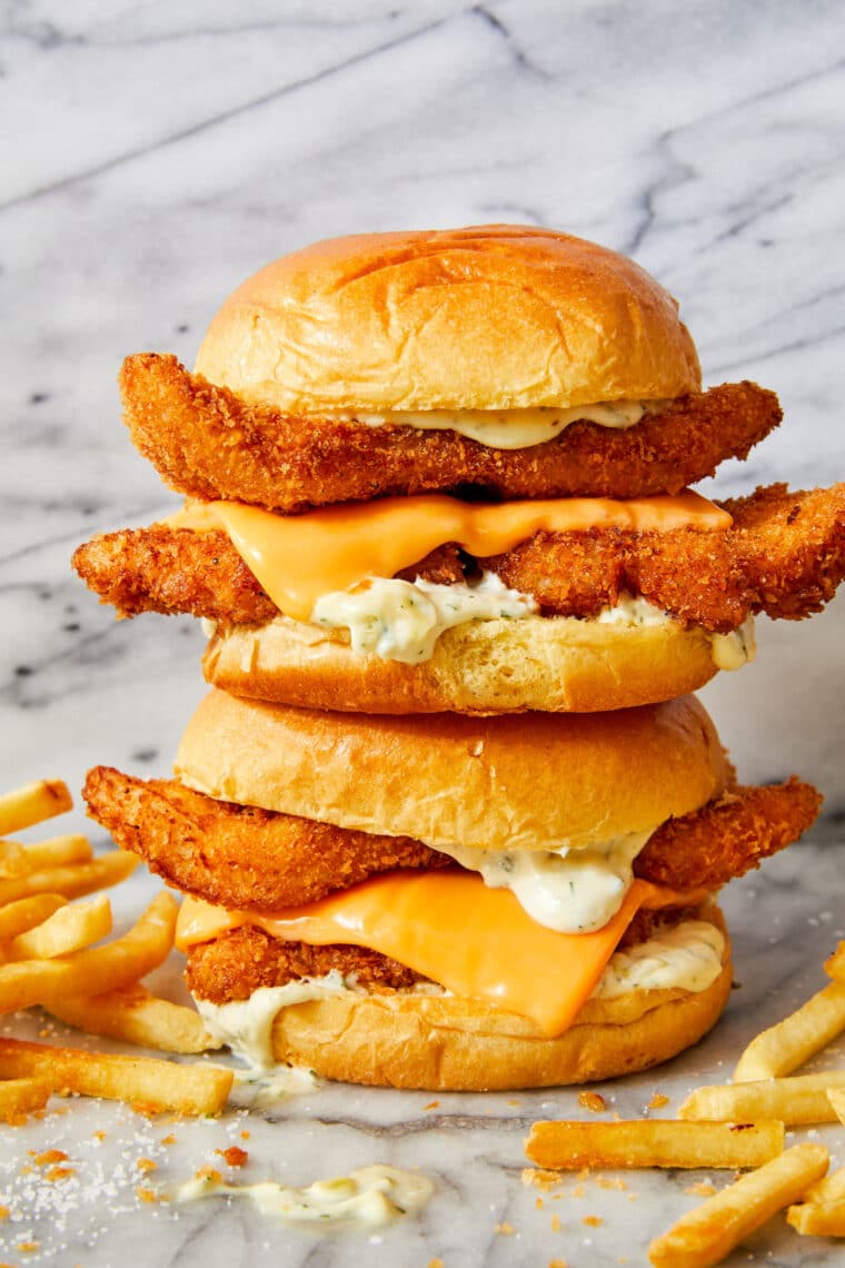 Crispy Fish Sandwiches - Oh-so-crisp fish sandwiches with melted cheese, soft brioche buns and homemade tartar sauce! Seriously so so good.