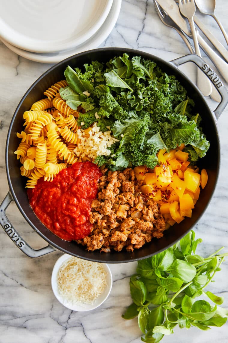 One Pot Sausage Pasta - With crumbled Italian sausage, sneaked in greens, marinara sauce and Parmesan. TRULY A ONE SKILLET DINNER! So so easy!