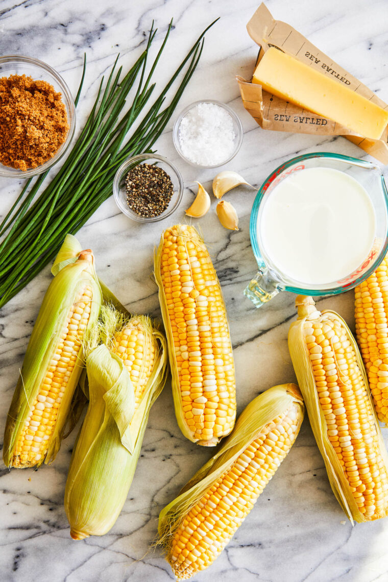 Boiled Corn on the Cob - Milk boiled corn! Truly THE ONLY way to cook corn on the cob (in an epic butter bath of course)! So buttery so sweet!