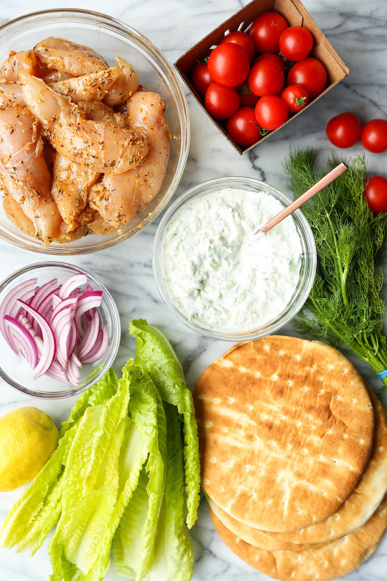 Greek Chicken Gyros - Easy, make-ahead chicken gyros! You can marinate the chicken ahead of time and whip up your homemade tzatziki too! So fast, so good!